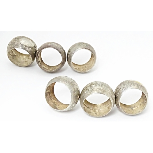 490 - A set of six white metal napkin rings with bird detail. Probably Indian (6)