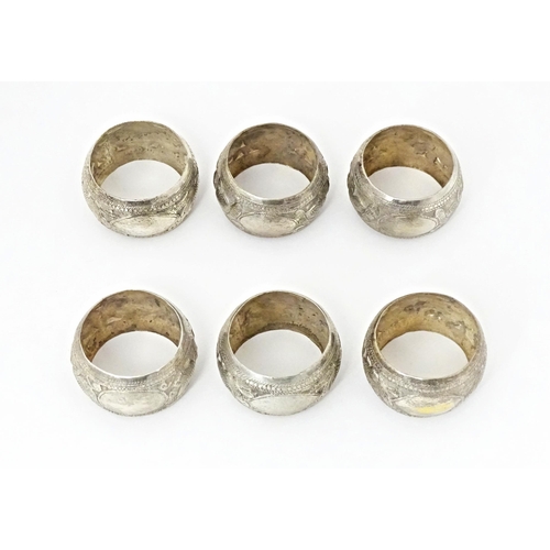 490 - A set of six white metal napkin rings with bird detail. Probably Indian (6)