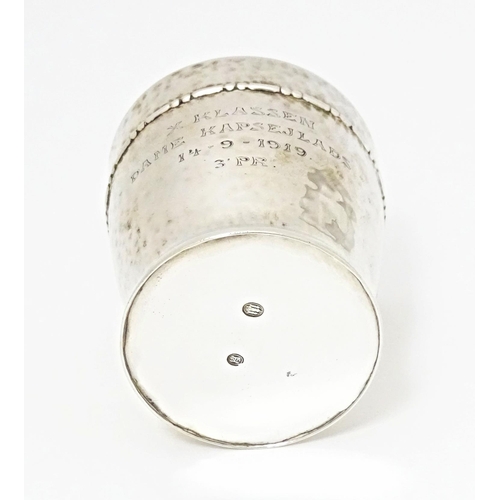 491 - Scandinavian silver : A Danish silver beaker with hammered finish. Marked under for assay master Chr... 