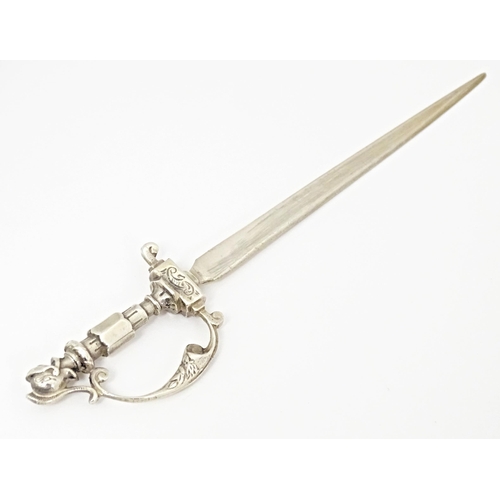 396 - A Dutch silver letter opener modelled as a sword. Approx. 6