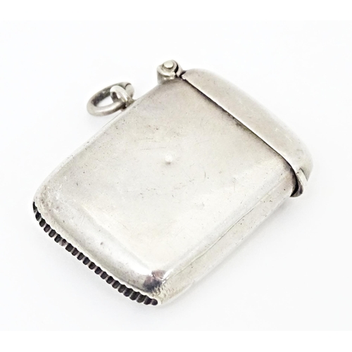 397 - A silver vesta case hallmarked Birmingham 1922, maker W. H. Haseler. Approx. 1 1/4