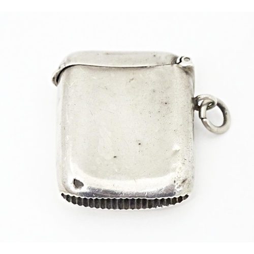 397 - A silver vesta case hallmarked Birmingham 1922, maker W. H. Haseler. Approx. 1 1/4