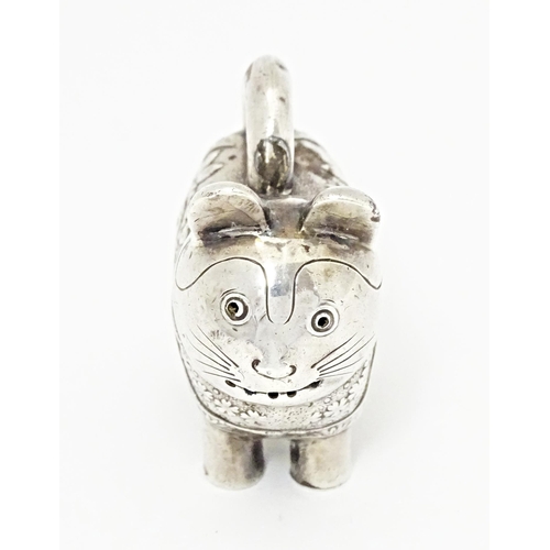 493 - An Oriental white metal novelty pepperette formed as a feline / cat /  neko. Marked with character m... 