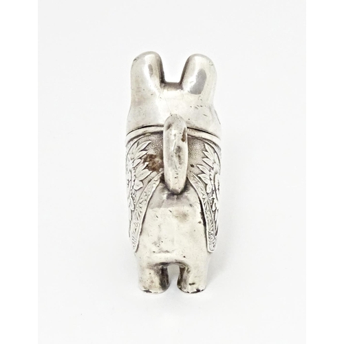 493 - An Oriental white metal novelty pepperette formed as a feline / cat /  neko. Marked with character m... 