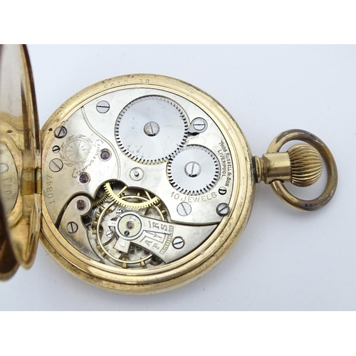 773 - A gold plated Illinois Watch Co. Elgin, Top wind pocket watch, the enamel dial signed Thos Russell &... 