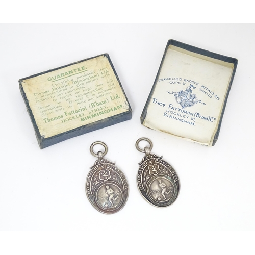 798 - Two silver football medals / medallions, for the Liverpool & District Church of England Sports Leagu... 