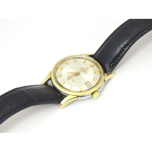 781 - An Omega Constellation automatic chromometer wrist watch, with gilt batons and date aperture at 3. D... 