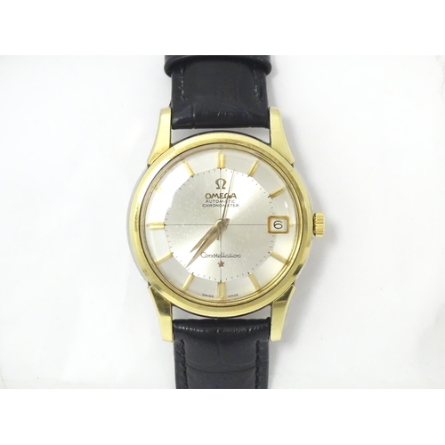 781 - An Omega Constellation automatic chromometer wrist watch, with gilt batons and date aperture at 3. D... 