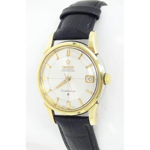 781 - An Omega Constellation automatic chromometer wrist watch, with gilt batons and date aperture at 3. D... 