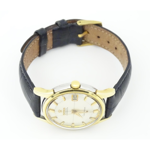 781 - An Omega Constellation automatic chromometer wrist watch, with gilt batons and date aperture at 3. D... 