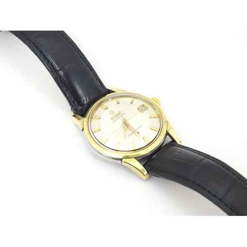 781 - An Omega Constellation automatic chromometer wrist watch, with gilt batons and date aperture at 3. D... 