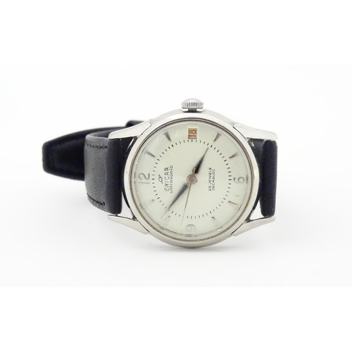 783 - A gents stainless steel cased Enicar ultrasonic 28 jewels incabloc wrist watch with date aperture at... 