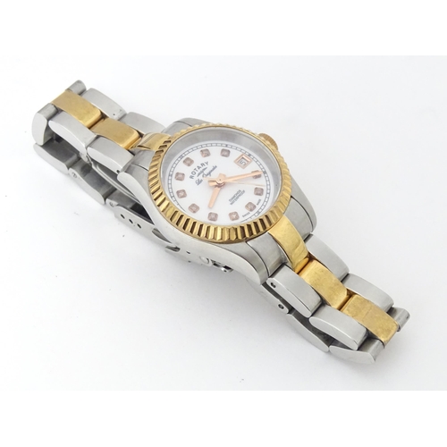 786 - A ladies Rotary 'Les Originales' diamond set wrist watch, with box and guarantee.