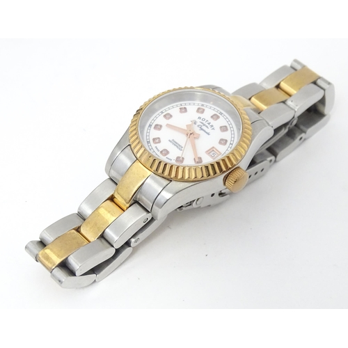 786 - A ladies Rotary 'Les Originales' diamond set wrist watch, with box and guarantee.