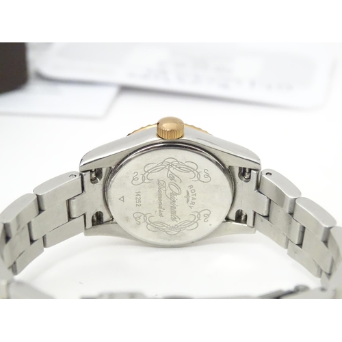 786 - A ladies Rotary 'Les Originales' diamond set wrist watch, with box and guarantee.