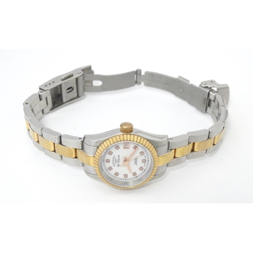 786 - A ladies Rotary 'Les Originales' diamond set wrist watch, with box and guarantee.