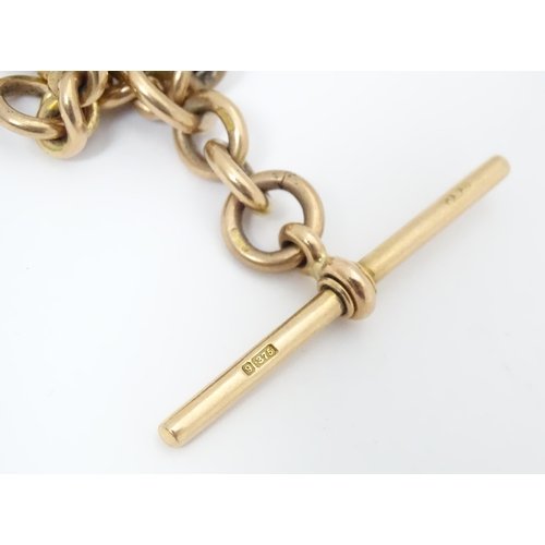 794 - A 9ct gold Albert watch chain. Approx. 18