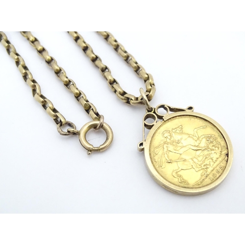 795 - An 1895 Victorian sovereign coin in a 9ct gold pendant mount, with yellow metal chain