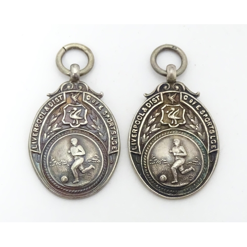 798 - Two silver football medals / medallions, for the Liverpool & District Church of England Sports Leagu... 