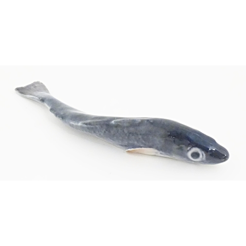 154 - A Royal Copenhagen model of a sardine / fish, model no. 459. Marked under. Approx. 6 1/4