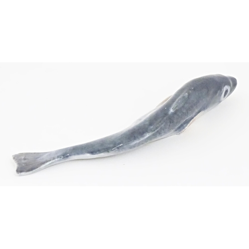 154 - A Royal Copenhagen model of a sardine / fish, model no. 459. Marked under. Approx. 6 1/4