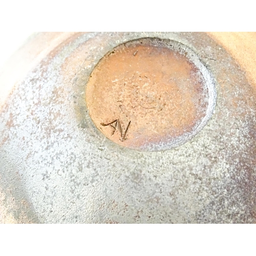 89 - A studio pottery raku pot with flat top by Andrew Niblett. Incised maker's mark under. Approx. 2 1/2... 