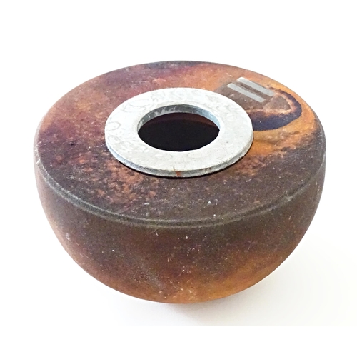 90 - A studio pottery raku pot with flat top by Andrew Niblett. Incised maker's mark under. Approx. 2 1/4... 