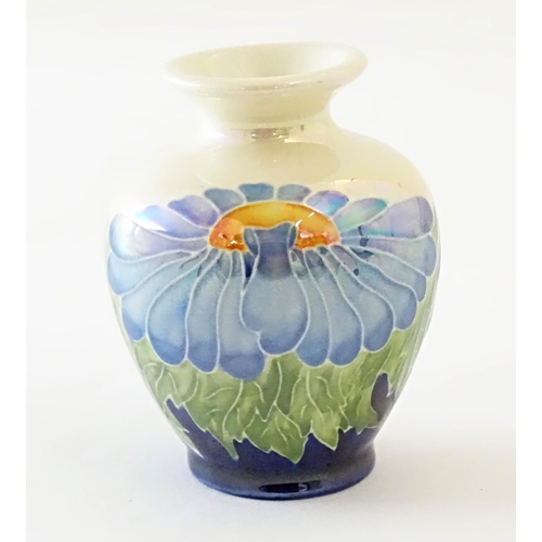 97 - A Lise B Moorcroft Moorland lustre vase with daisy flower detail. Signed under. Approx. 3