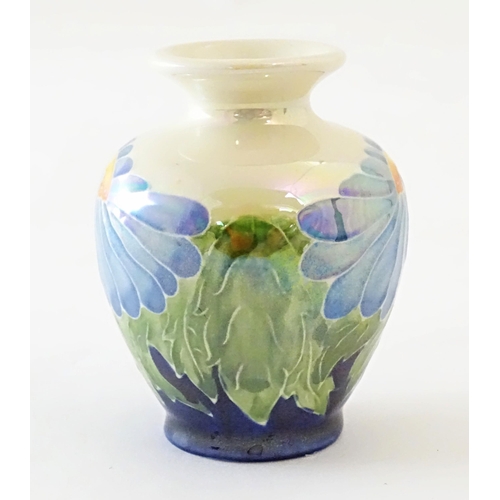 97 - A Lise B Moorcroft Moorland lustre vase with daisy flower detail. Signed under. Approx. 3