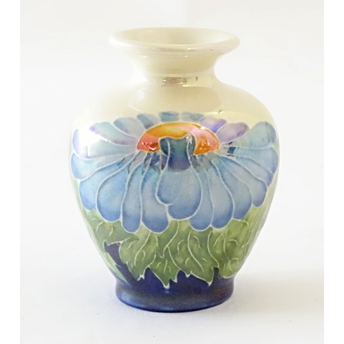 97 - A Lise B Moorcroft Moorland lustre vase with daisy flower detail. Signed under. Approx. 3