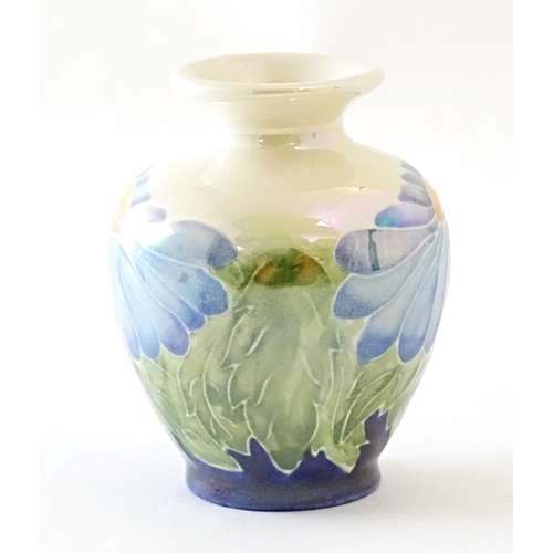 97 - A Lise B Moorcroft Moorland lustre vase with daisy flower detail. Signed under. Approx. 3