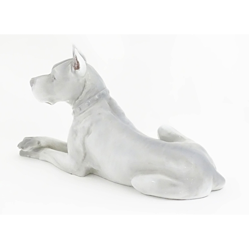 129 - A Continental model of a Great Dane dog. Indistinctly signed under. Approx. 13 1/2