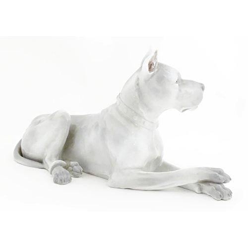 129 - A Continental model of a Great Dane dog. Indistinctly signed under. Approx. 13 1/2