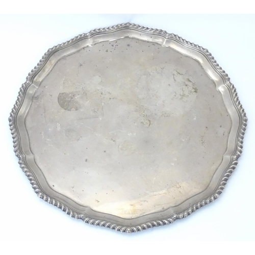 277 - A large silver salver / tray, hallmarked Birmingham 1924, maker Alexander Clark Co. Ltd. Approx. 19