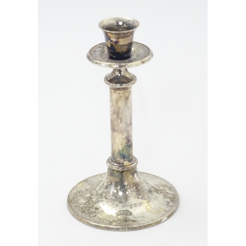 524 - A quantity of assorted silver plated and other metal wares to include candlestick, card tray, cups, ... 