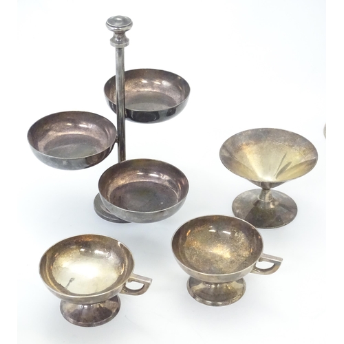 524 - A quantity of assorted silver plated and other metal wares to include candlestick, card tray, cups, ... 