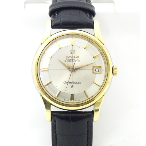 781 - An Omega Constellation automatic chromometer wrist watch, with gilt batons and date aperture at 3. D... 