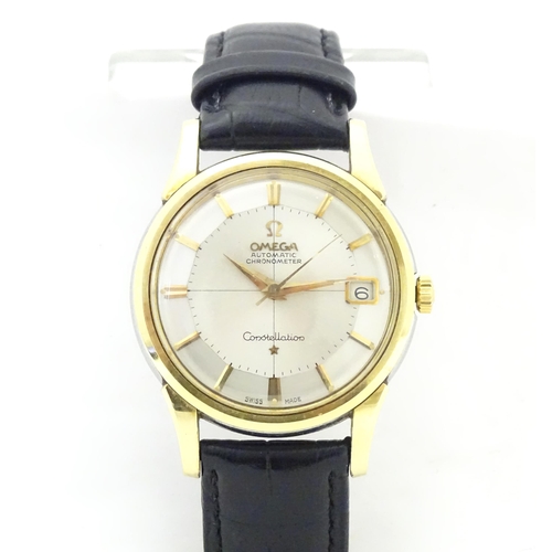 781 - An Omega Constellation automatic chromometer wrist watch, with gilt batons and date aperture at 3. D... 