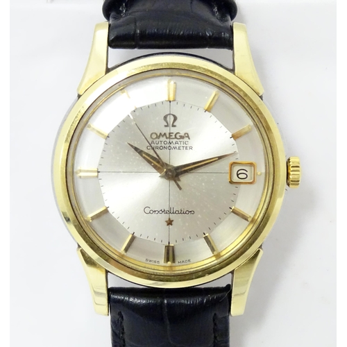 781 - An Omega Constellation automatic chromometer wrist watch, with gilt batons and date aperture at 3. D... 