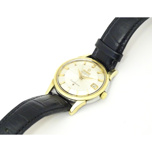 781 - An Omega Constellation automatic chromometer wrist watch, with gilt batons and date aperture at 3. D... 