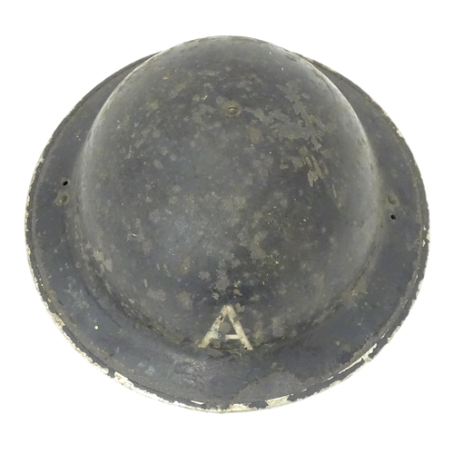 802 - Militaria : two WWII / World War 2 / WW2 / Second World War Civil Defence 'Brodie' helmets, marked '... 