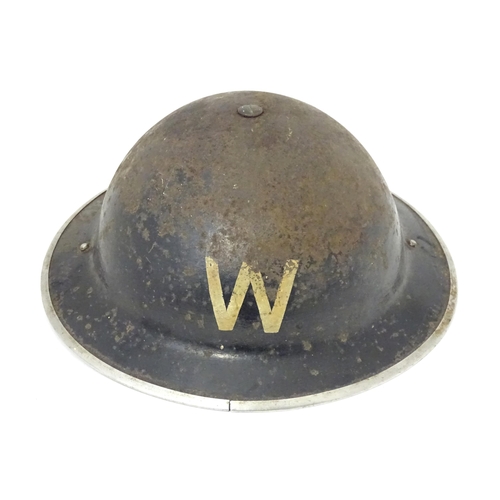 802 - Militaria : two WWII / World War 2 / WW2 / Second World War Civil Defence 'Brodie' helmets, marked '... 