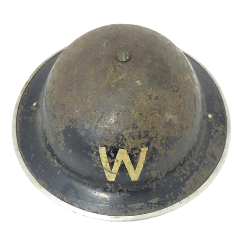 802 - Militaria : two WWII / World War 2 / WW2 / Second World War Civil Defence 'Brodie' helmets, marked '... 