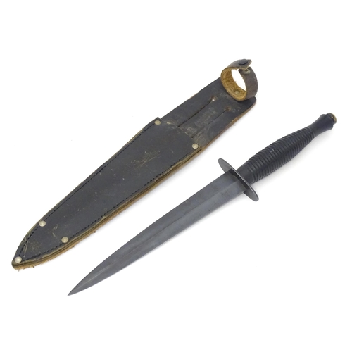 804 - Militaria : a third pattern Fairburn Sykes fighting knife / commando dagger by A. Wright & Son , She... 