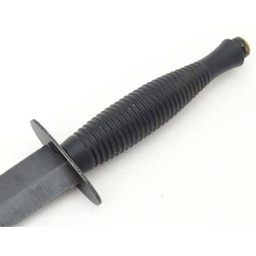 804 - Militaria : a third pattern Fairburn Sykes fighting knife / commando dagger by A. Wright & Son , She... 