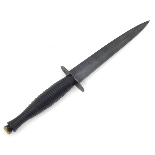 804 - Militaria : a third pattern Fairburn Sykes fighting knife / commando dagger by A. Wright & Son , She... 