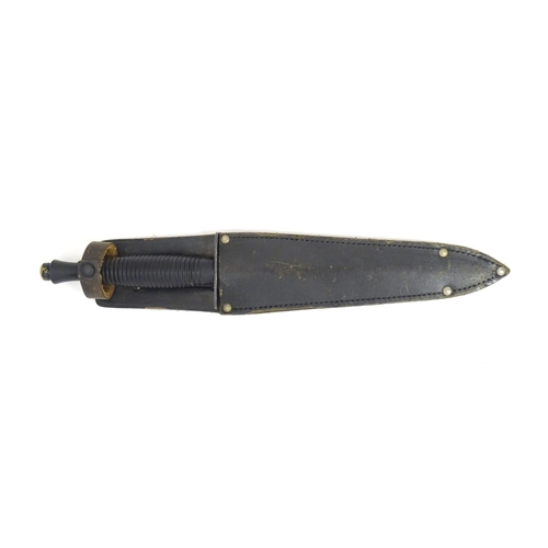 804 - Militaria : a third pattern Fairburn Sykes fighting knife / commando dagger by A. Wright & Son , She... 