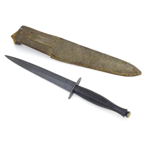 804 - Militaria : a third pattern Fairburn Sykes fighting knife / commando dagger by A. Wright & Son , She... 