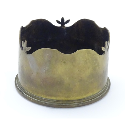 814 - Militaria, WWI / World War I  / WW1 / First World War : a Trench Art candle stand cut from an 18 Pdr... 