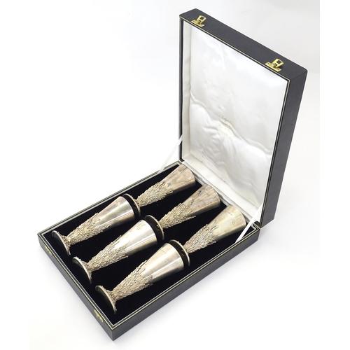 264 - Jocelyn Burton : A cased set of six Elizabeth II Modernist silver goblets / flutes, of conical form ... 